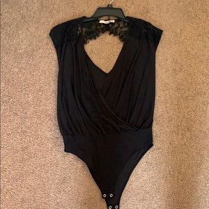 Lacey body suit - never worn